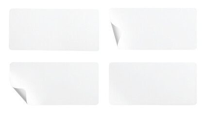 Four white rectangular cards with slightly curled corners, arranged in a 2x2 grid.