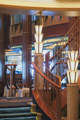 Formal and elegant ocean view dining room restaurant onboard luxury cruiseship or cruise ship liner...