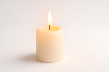 Single White Candle Flame on Soft Background for Relaxation and Peace