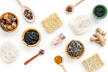 Rice vermicelli, noodles, spices, weeds pattern to cook Chinese and Japanese food on white background top view