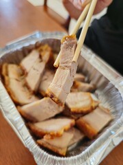 Roasted crispy pork in aluminium foil