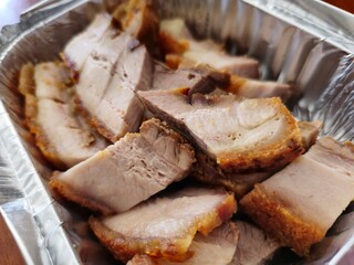 Roasted Crispy pork chops in aluminium foil