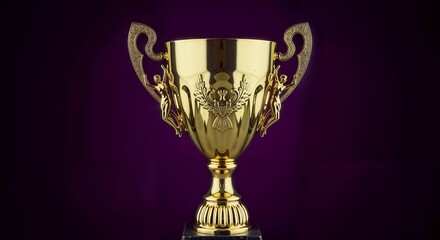 A golden luxurious trophy cup isolated on deep purple solid background