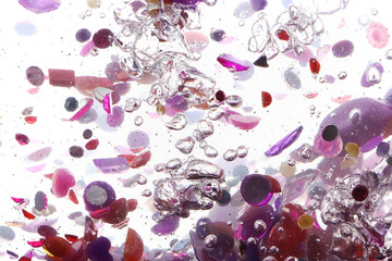 pink glitter, crystals and stones and bubbles in the water, beautiful original shiny background, glitter tornado
