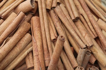 Cinnamon is a spice obtained from the inner bark of several tree species from the genus Cinnamomum. It is used mainly as an aromatic condiment and flavouring additive in a wide variety of cuisines