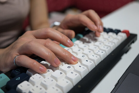 Woman multitasking with work and pet care at home
