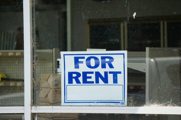 For rent sign in window of business