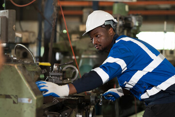 Industry factory, machine. Engineer worker, maintain, repair mechanism of operation of lathe...