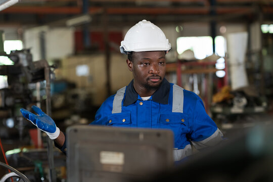 Industry factory, machine. Engineer worker, maintain, repair mechanism of operation of lathe machine in factory