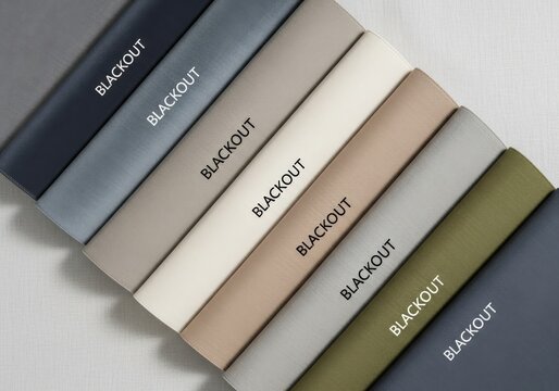 Assorted blackout curtains displayed in various colors on white background