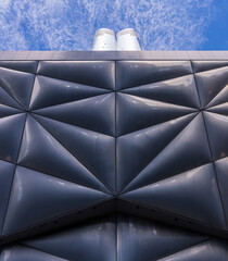 Unique pillowed and reflective retractable shell over the Shed in Hudson Yards New York City with skyscrapers above