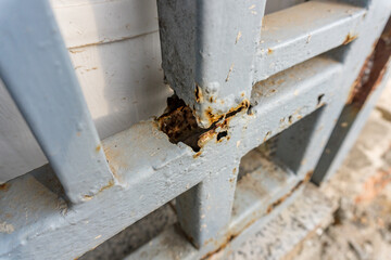Rust on old and porous iron fence