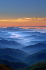 Fototapeta premium Serene Mountain Layers at Sunset with Glowing Mist - Nature Horizon