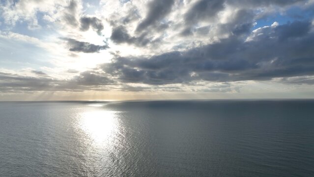 Morning sunlight on peaceful, relaxing ocean and beach at Litchfield Beach, South Carolina low country lifestyle aerial view summer morning by the Atlantic coast