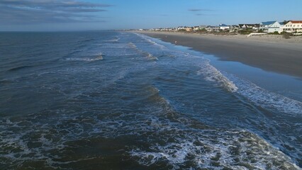 Relaxing ocean surf and waves in early morning sunlight at Litchfield Beach South Carolina 
