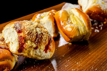 
Various sweet breads, with different flavors, made with flour, sugar, vanilla cream, guava and...