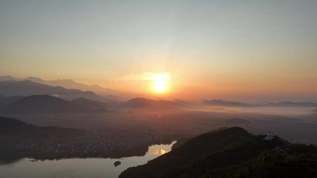 Sunrise Over Pokhara Valley with Mountain Silhouettes and Phewa Lake &ndash; Nepal