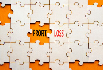 Fototapeta premium Profit or Loss symbol. Concept word Profit or Loss on wooden puzzle. Beautiful orange background. Business and Profit or Loss concept. Copy space