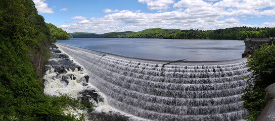 water pouring down the croton dam in westchester new york (natural and man made waterfall river)...