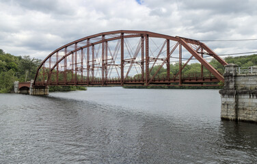 scenic steel metal bridge road crossing over old croton aqueduct in upstate new york (nyc city water supply) scenic location westchester county surface river water arch suspension truss trestle