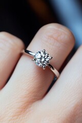 Elegant Diamond Engagement Ring on Finger with Polished Band