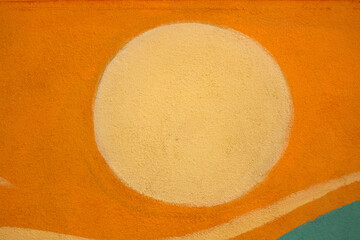 Abstract Light Circle on Orange Textured Wall Background
