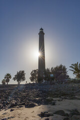 Faro de Maspalomas Spain seascape, beach and lighthouse Faro and sand dunes in Gran Canaria