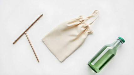 Reusable items like metal straw, cloth bag, and glass bottle arranged neatly, top-down view on white backdrop, promoting eco-friendly living