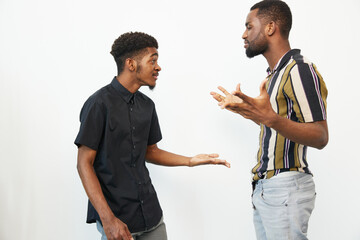 Engaging conversation between two African American men, showcasing expressions of enthusiasm and...
