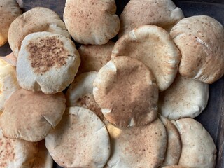 A group of traditional countryside bread baked on a clay oven.