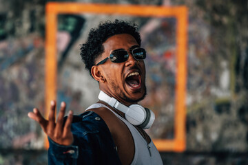 young man on the street shouting