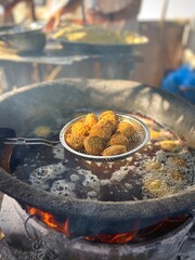 Frying falafel in oil, traditional Arabic food.