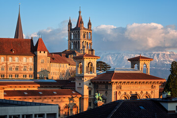 Old town of Lausanne city and Alps mountains, Switzerland