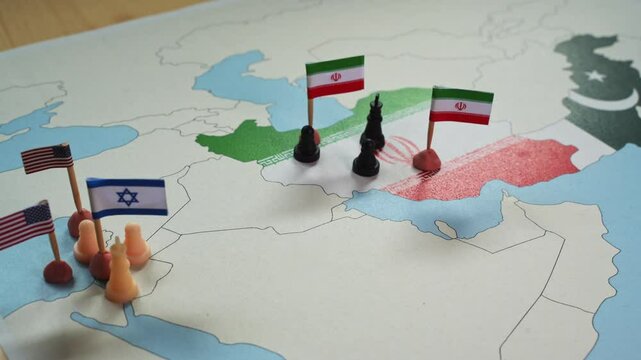 Chess pieces and flags on a map represent the geopolitical conflict between Iran and Israel, with the involvement of USA and other nations