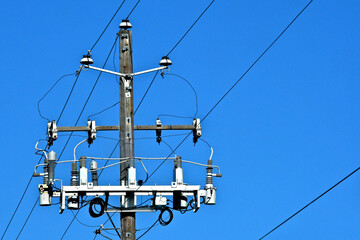Upgraded components to old electric pole to help protect the electric grid 