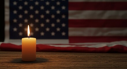 Illuminated Remembrance - A single candle burns brightly, its flame casting a warm glow against the softly draped folds of an American flag. A poignant of remembrance and reflection