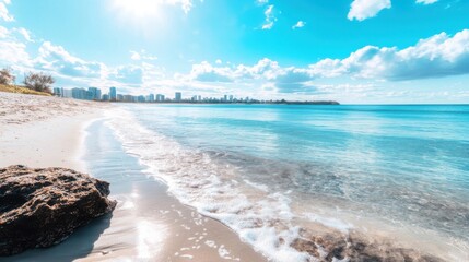 Fototapeta premium beach with a bright blue sky and Australia city landscape in a background 