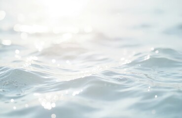 Blurred transparent white colored clear water surface texture. Calm water waves with shining pattern texture background. Clear, clean ocean water waves, splashes with bubbles. Good photo for