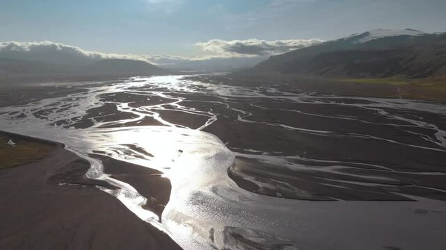Aerial View of Braided River in Mountain Valley Landscape