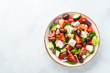 Greek salad, healthy food, mediterranean diet. Fresh vegetables, cheese and olive oil.