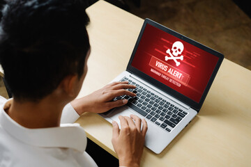 Virus warning alert on computer screen detected modish cyber threat , hacker, computer virus and malware
