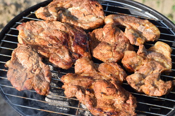 cooking chicken meat in the barbecue