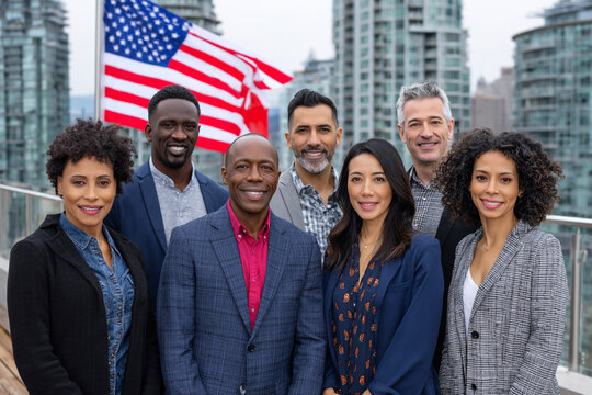 Diverse Group with American Flag and City Skyline