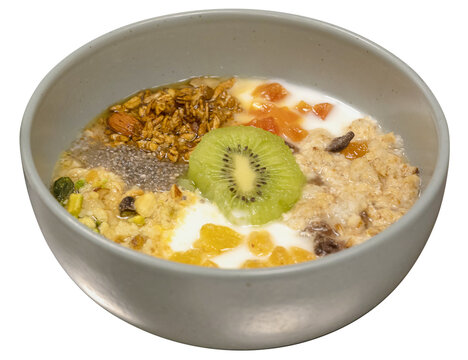 Close up top view breakfast bowl isolated on white background. a bowl of Greek yogurt with mixed dried fruits and fresh kiwi and granola cereal with chia seeds.