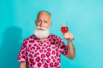 Photo of funny aged man hold cocktail wear leopard print outfit isolated on teal color background