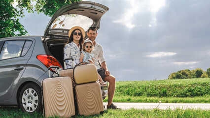Family in car. Man woman child traveling. Summer adventure road smile.
