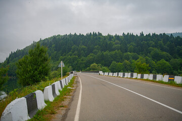 A car-free road in the morning in the fog in Georgia