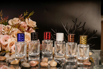 Colorful and elegant fragrance containers in a decorative scene.