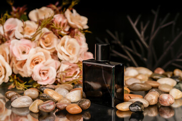 Luxury scent bottles with floral and natural stone elements for a high-end presentation.