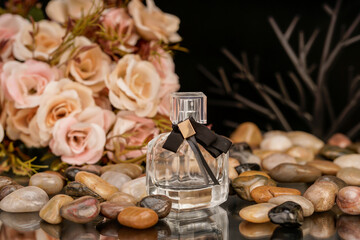 Clear glass perfume containers with metallic lids, perfect for beauty product promotion.